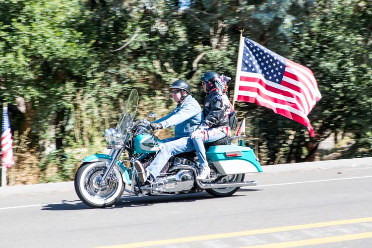 Motorcycle rider in the canyon during the  Nuvision Freedom Ride